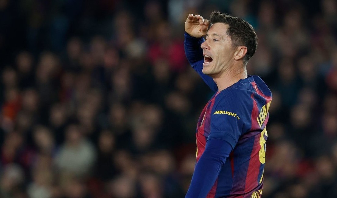 Robert Lewandowski saat bermain untuk Barcelona di Liga Champions